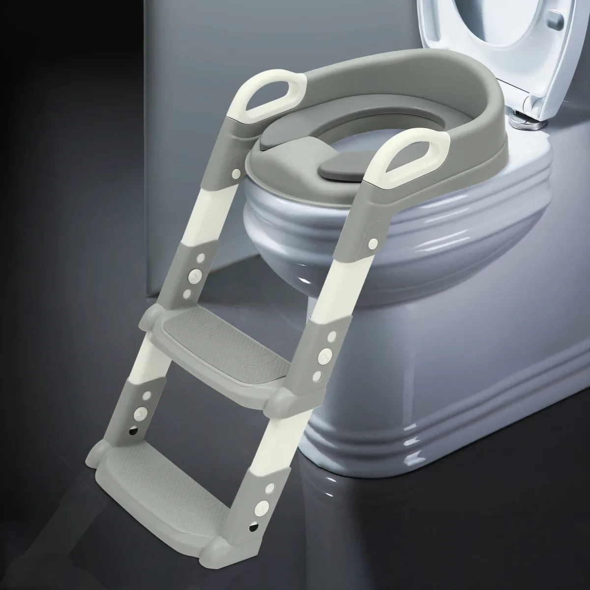 Réducteur de toilettes pliable avec marches